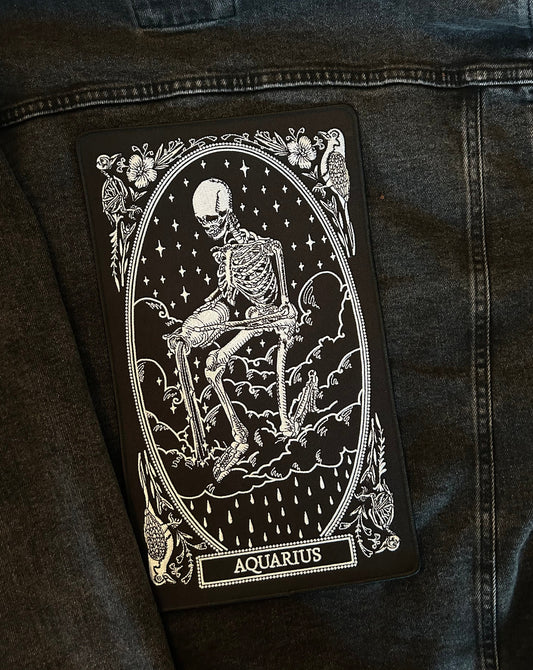 large embroidered back patch of aquarius zodiac sign from the mirror oracle deck by amrit brar and 13th press.
