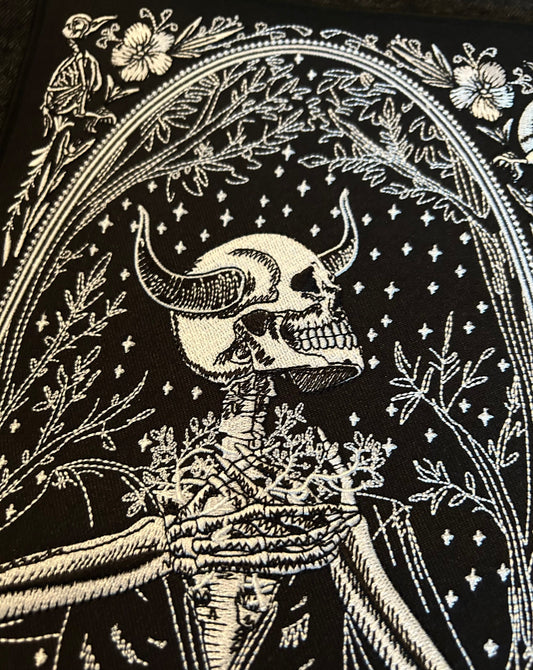 large embroidered back patch of taurus zodiac sign from the mirror oracle deck by amrit brar and 13th press.