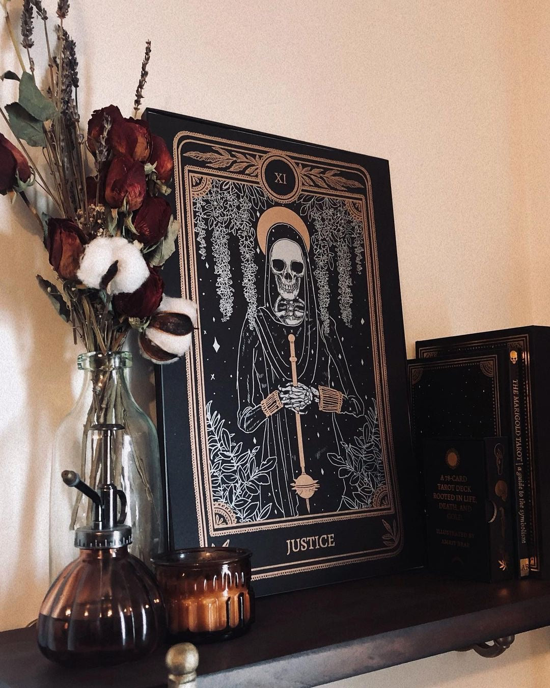 tarot art print with Justice card design from the Marigold Tarot deck by Amrit Brar and 13th Press. Black and gold ink.