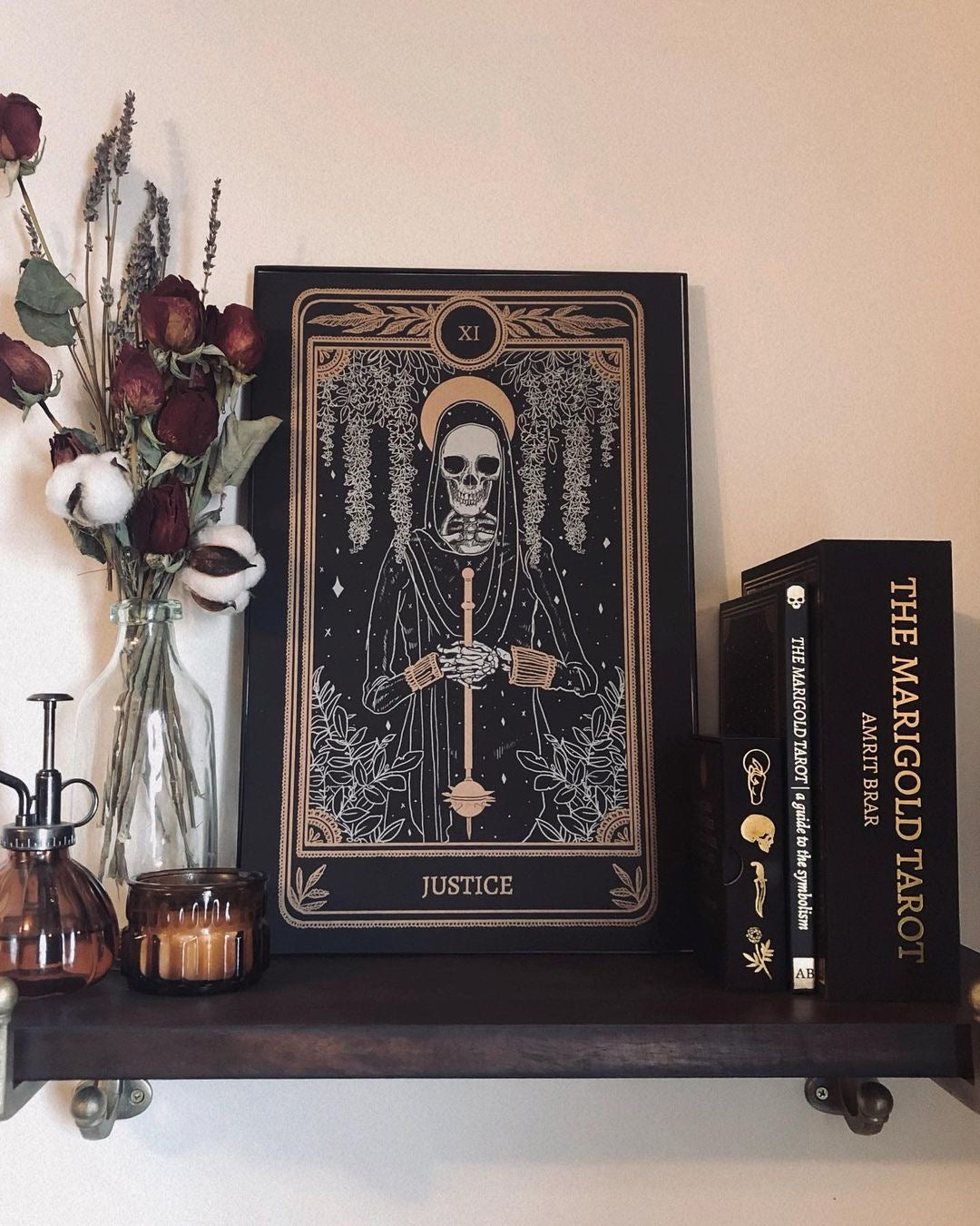 tarot art print with Justice card design from the Marigold Tarot deck by Amrit Brar and 13th Press. Black and gold ink.