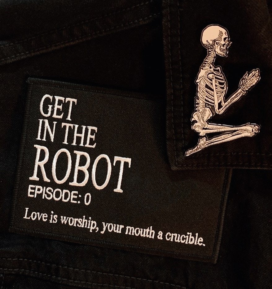 black and white thread embroidered iron-on patch designed by Amrit Brar and 13th Press. Iron-on denim patch