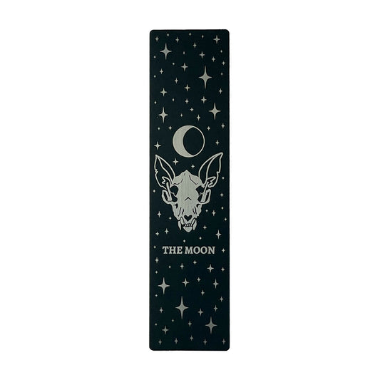 bookmark with moon tarot card design. Art from the Marigold tarot deck by Amrit Brar and 13th Press. Black and silver metal bookmark. Tarot accessory.