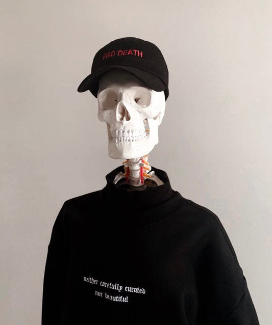 black embroidered dad cap with ego death