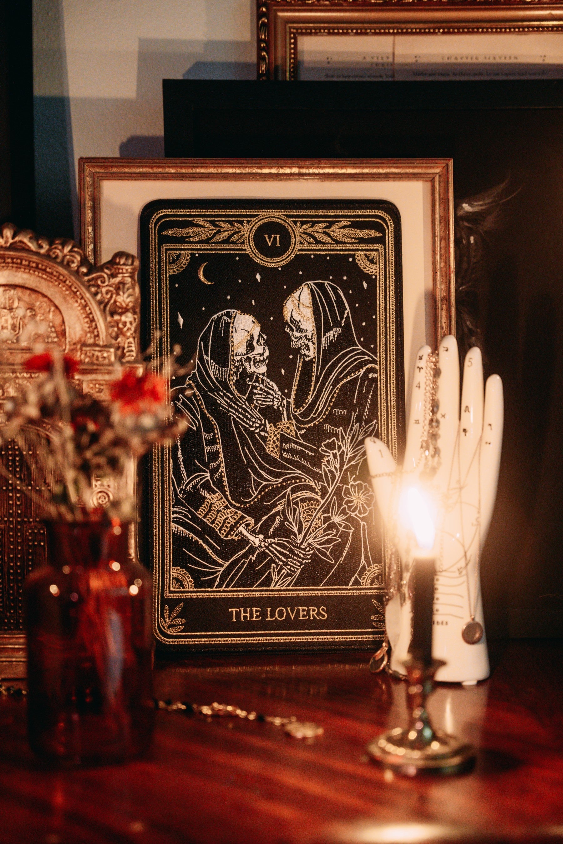 machine embroidered large iron-on back patch of the Lovers tarot card design from the Marigold Tarot deck by Amrit brar and 13th Press. Two skeleton figures embracing.