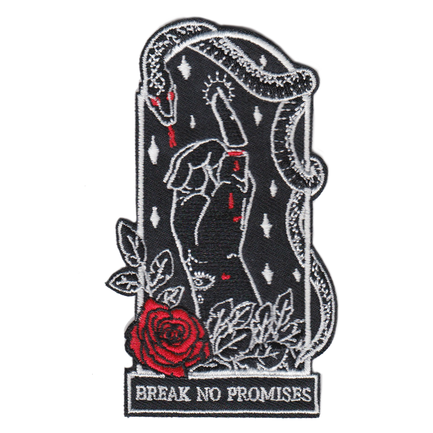 2.5"Wx4"H coffin-shaped embroidered patch featuring an iron-on backing. Patch reads "break no promises." We recommend that you apply a few stitches so the corners do not lift. Designed by Amrit Brar, produced by 13th Press. Embroidered patch, iron-on patch, denim patch, leather patch, biker patch, punk patch