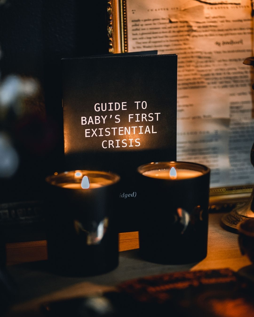 soy wax candles with gold foil design of luna moth, crescent moons, and bat. Features zine by Amrit Brar and 13th Press.