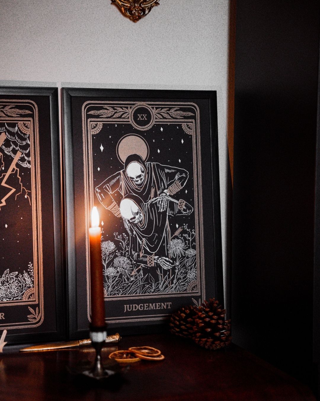 tarot art print of judgement card from Marigold Tarot deck by Amrit Brar and 13th Press. Candle and eucalyptus in background.