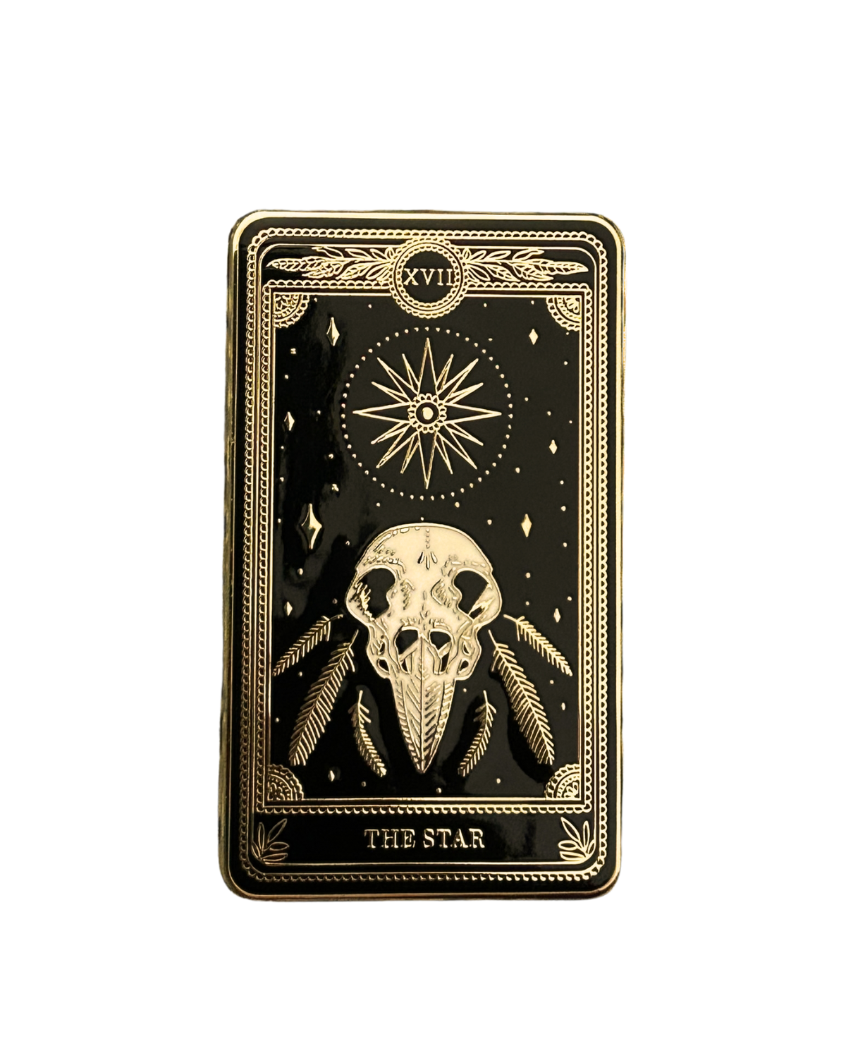 hard enamel pin of the star tarot card from the marigold tarot deck