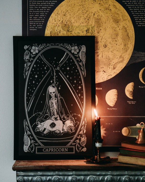 capricorn zodiac sign art print with candle light on altar