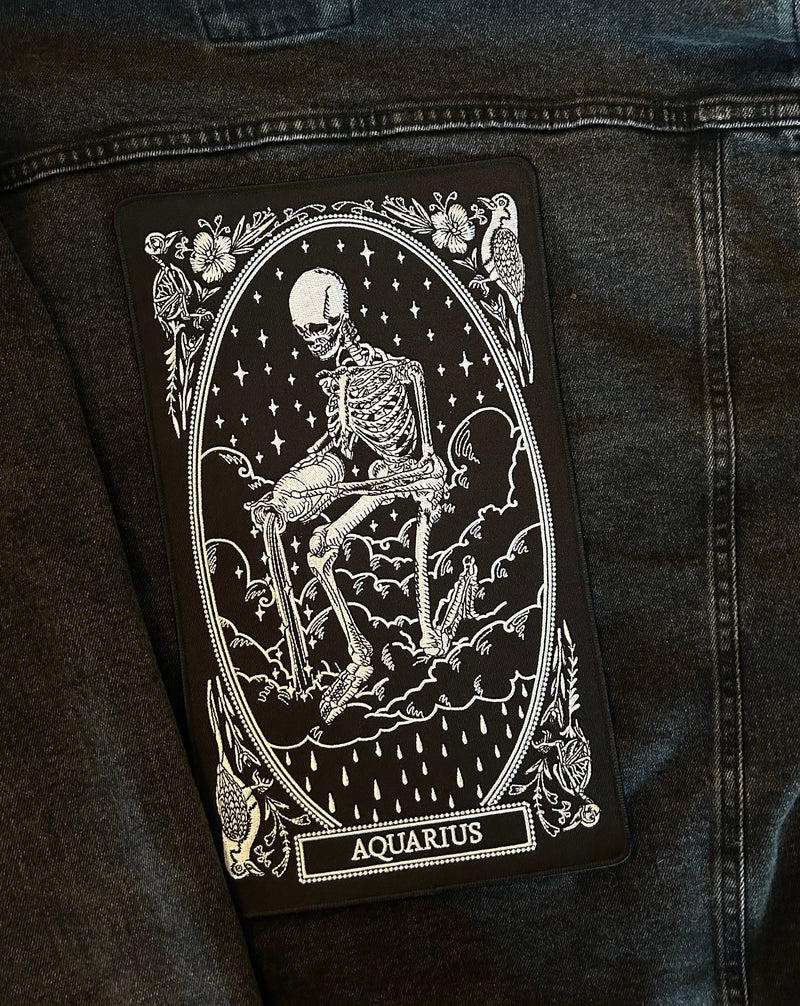 large embroidered back patch of aquarius zodiac sign from the mirror oracle deck by amrit brar and 13th press.