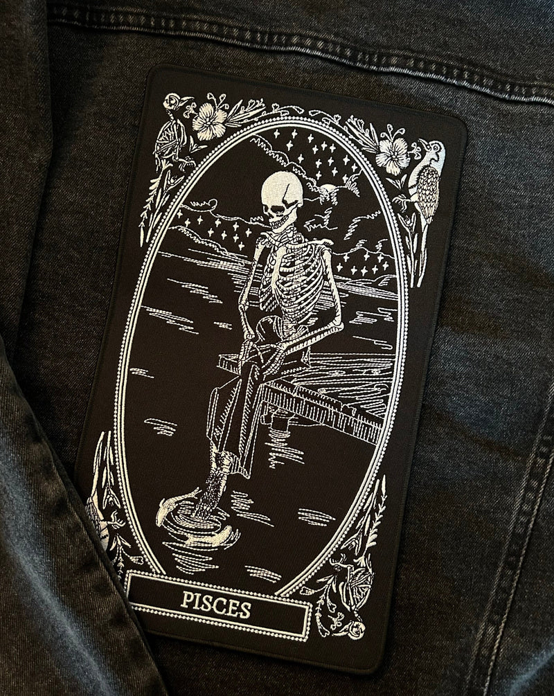 large embroidered back patch of pisces zodiac sign from the mirror oracle deck by amrit brar and 13th press.
