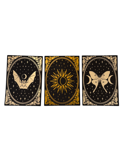 Three decorative cards with celestial designs on a white background