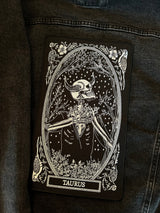 large embroidered back patch of taurus zodiac sign from the mirror oracle deck by amrit brar and 13th press.
