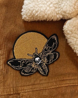 moth and moon embroidered iron-on patch for customizing denim jackets