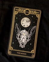 large embroidered back patch of the Moon design from the Marigold Tarot by Amrit Brar and 13th Press on black denim jacket.