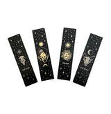 Bookmark bundle with the Star, Sun, Moon, Marigold Night designs from Marigold Tarot deck by Amrit Brar and 13th Press. Black, gold, and silver metal.