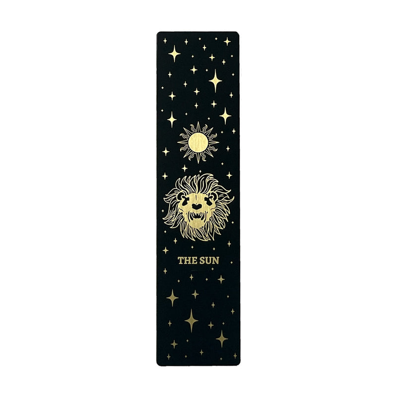 Bookmark bundle with the Star, Sun, Moon, Marigold Night designs from Marigold Tarot deck by Amrit Brar and 13th Press. Black, gold, and silver metal.