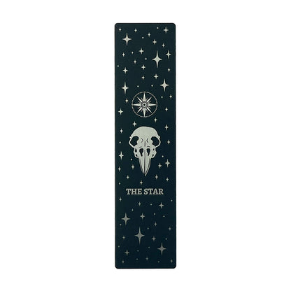 bookmark with the Star tarot card design. Art from the Marigold tarot deck by Amrit Brar and 13th Press. Black and silver metal bookmark.