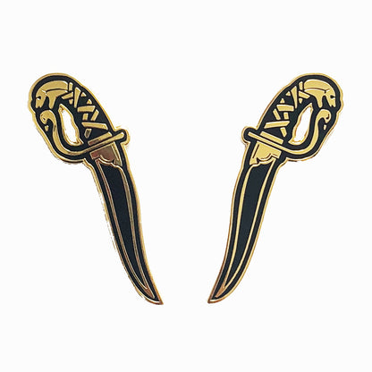 gold and black hard enamel pin set of kirpans, twin blades with serpent heads designed by Amrit Brar and 13th Press