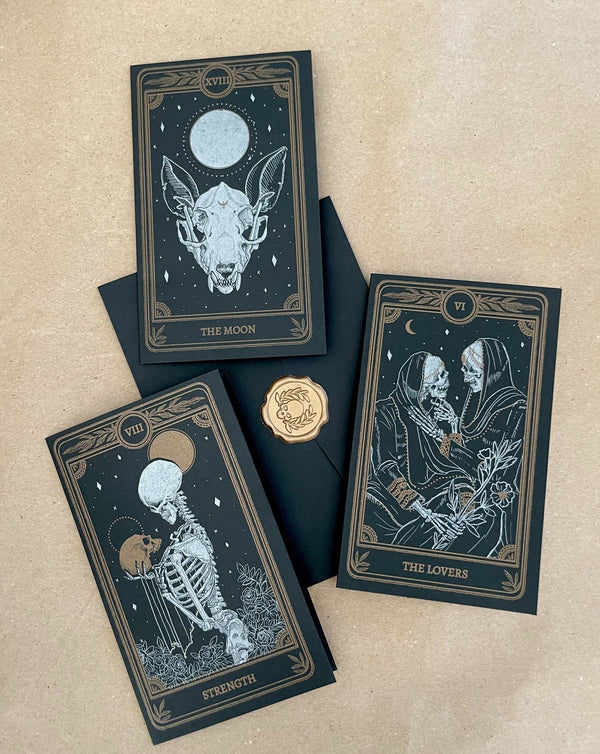 greeting card bundle of three cards with Strength, The Lovers, and the Moon tarot card designs from the Marigold Tarot deck by Amrit Brar and 13th Press