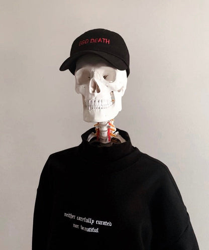 black embroidered dad cap with ego death