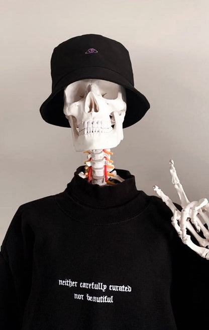 embroidered bucket hat with purple eye