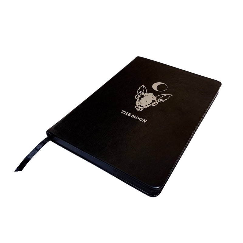 Lined journal with The Moon silver foil designed from the Marigold Tarot deck. Black ribbon