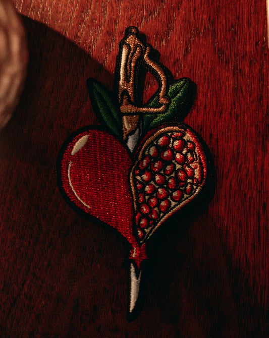 embroidered iron-on patch of pomegranate love design by Amrit Brar and 13th Press.