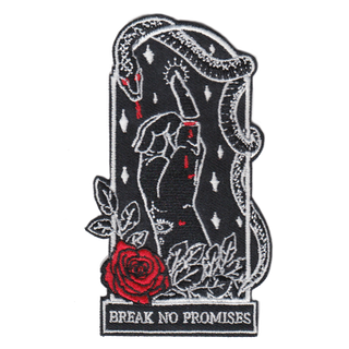 2.5"Wx4"H coffin-shaped embroidered patch featuring an iron-on backing. Patch reads "break no promises." We recommend that you apply a few stitches so the corners do not lift. Designed by Amrit Brar, produced by 13th Press. Embroidered patch, iron-on patch, denim patch, leather patch, biker patch, punk patch