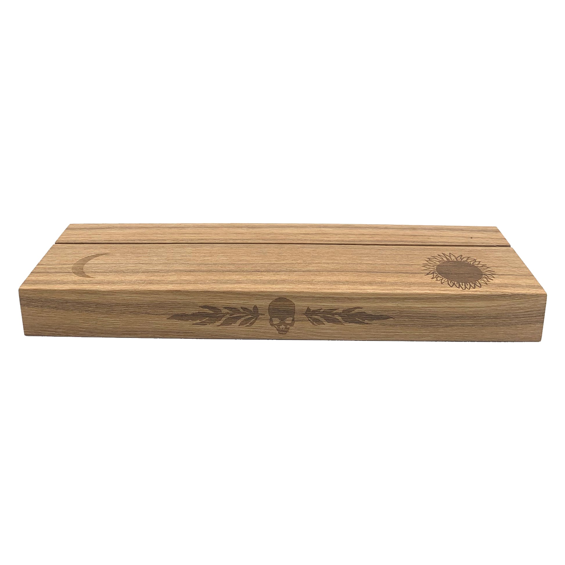 Ash wood stand featuring a hot-stamp of a skull and marigold leaves, waning crescent moon, and the sun. Excellent for holding and displaying readings while working, or for decorating your altar or desk. Comfortably fits three standard size 2.75” x 4.75” tarot or oracle cards. Stand colour may vary slightly due to differences in wood colouration. Dimensions: Approx 11.75" L x 3.5" W x 1.25" H / 30cm L x 9cm W x 3.18cm H. Composition: Ash wood. Tarot, altar, altar stand, tarot card stand, altar decor