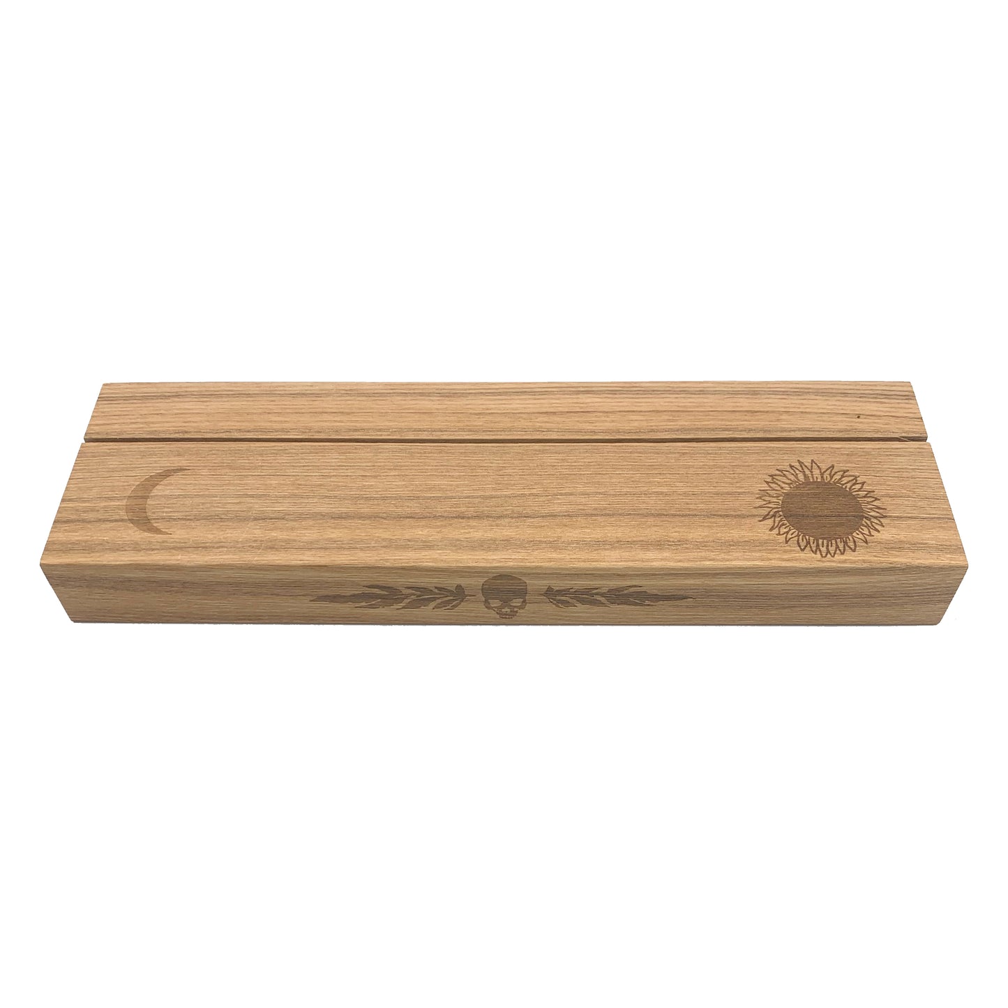 Ash wood stand featuring a hot-stamp of a skull and marigold leaves, waning crescent moon, and the sun. Excellent for holding and displaying readings while working, or for decorating your altar or desk. Comfortably fits three standard size 2.75” x 4.75” tarot or oracle cards. Stand colour may vary slightly due to differences in wood colouration. Dimensions: Approx 11.75" L x 3.5" W x 1.25" H / 30cm L x 9cm W x 3.18cm H. Composition: Ash wood. Tarot, altar, altar stand, tarot card stand, altar decor