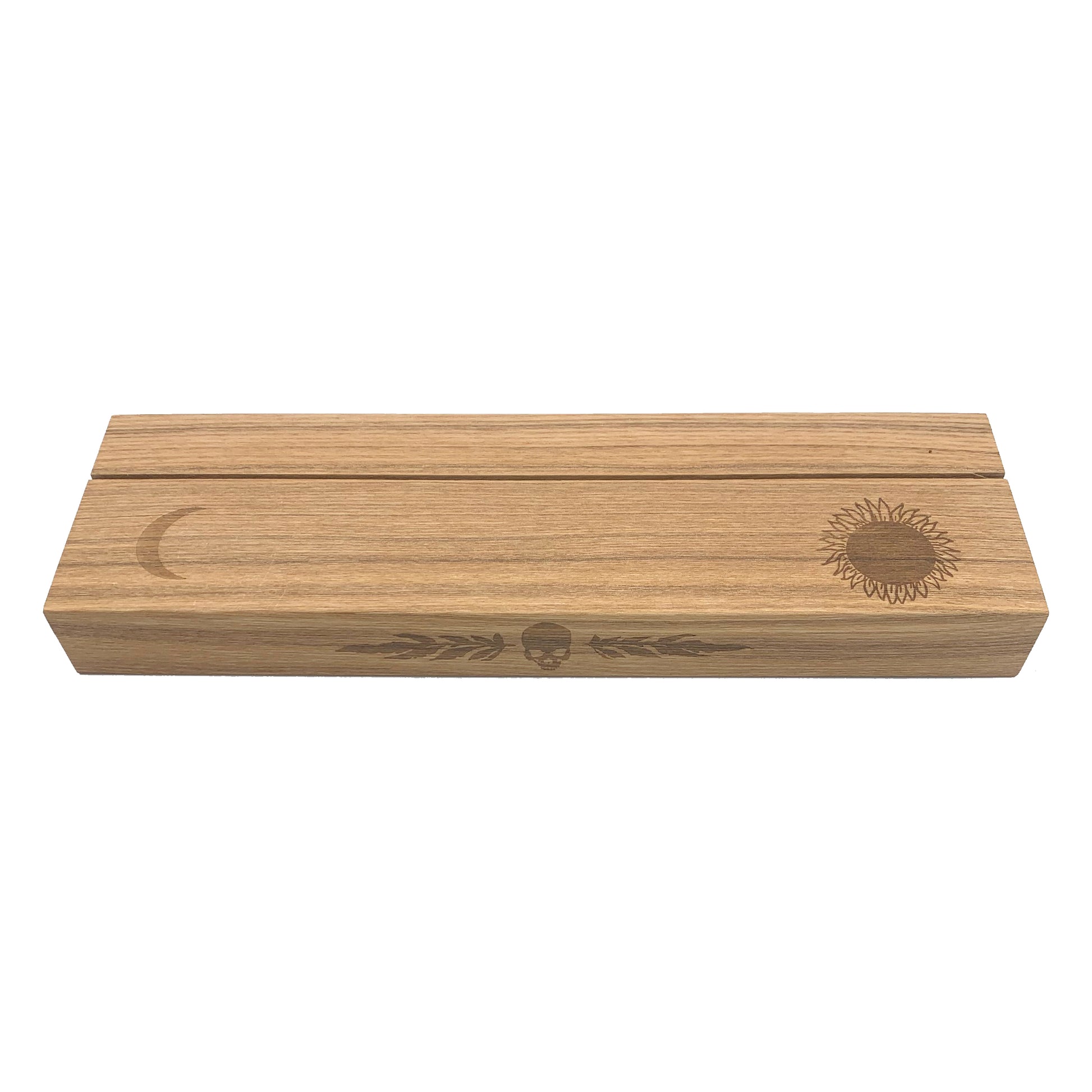 Ash wood stand featuring a hot-stamp of a skull and marigold leaves, waning crescent moon, and the sun. Excellent for holding and displaying readings while working, or for decorating your altar or desk. Comfortably fits three standard size 2.75” x 4.75” tarot or oracle cards. Stand colour may vary slightly due to differences in wood colouration. Dimensions: Approx 11.75" L x 3.5" W x 1.25" H / 30cm L x 9cm W x 3.18cm H. Composition: Ash wood. Tarot, altar, altar stand, tarot card stand, altar decor