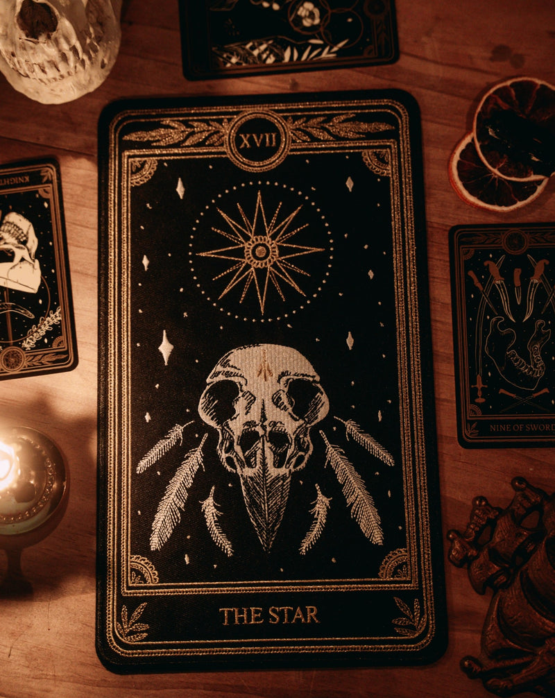 the star tarot card embroidered back patch, design from the Marigold Tarot deck by Amrit Brar and 13th press. 
