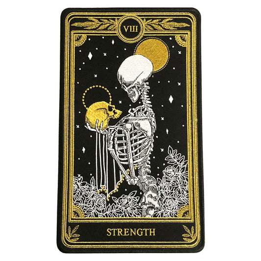 strength tarot card large embroidered back patch with black, gold, and white thread, design from the Marigold Tarot deck by Amrit Brar and 13th Press.