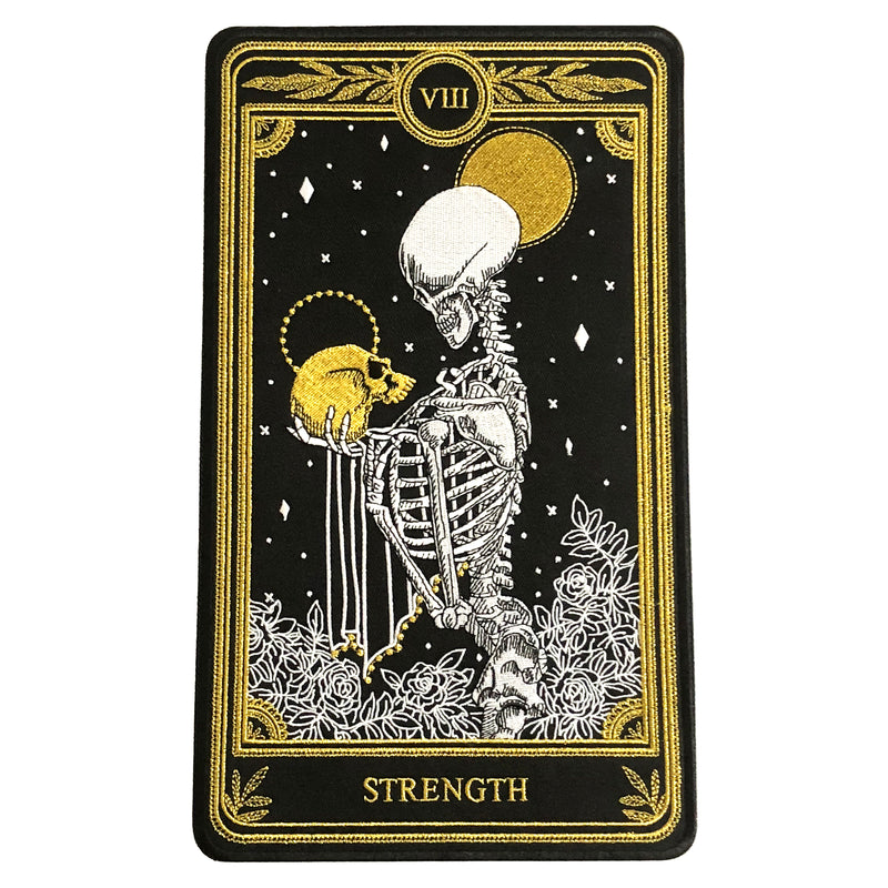 strength tarot card large embroidered back patch with black, gold, and white thread, design from the Marigold Tarot deck by Amrit Brar and 13th Press.