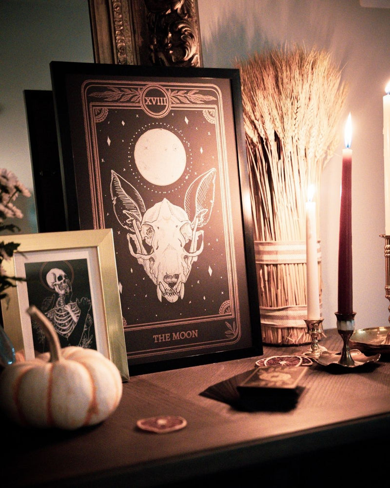 tarot art print of the Moon card from the Marigold Tarot deck by Amrit Brar and 13th Press. With skeleton and candle and pumpkin