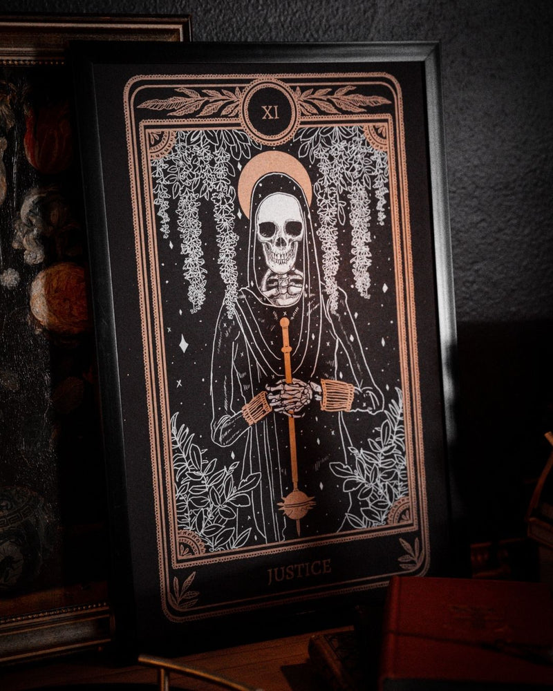 tarot art print with Justice card design from the Marigold Tarot deck by Amrit Brar and 13th Press. Black and gold ink.
