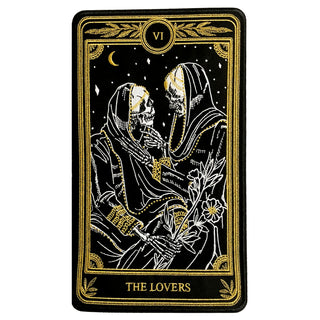 machine embroidered large iron-on back patch of the Lovers tarot card design from the Marigold Tarot deck by Amrit brar and 13th Press. Two skeleton figures embracing.