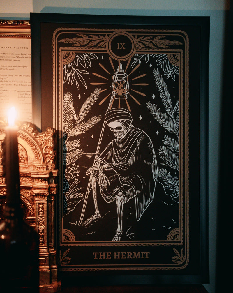 art print of the Hermit tarot card from the Marigold Tarot deck by Amrit Brar and 13th Press with jaw bone and candle light. Wall art, framed art, home decor