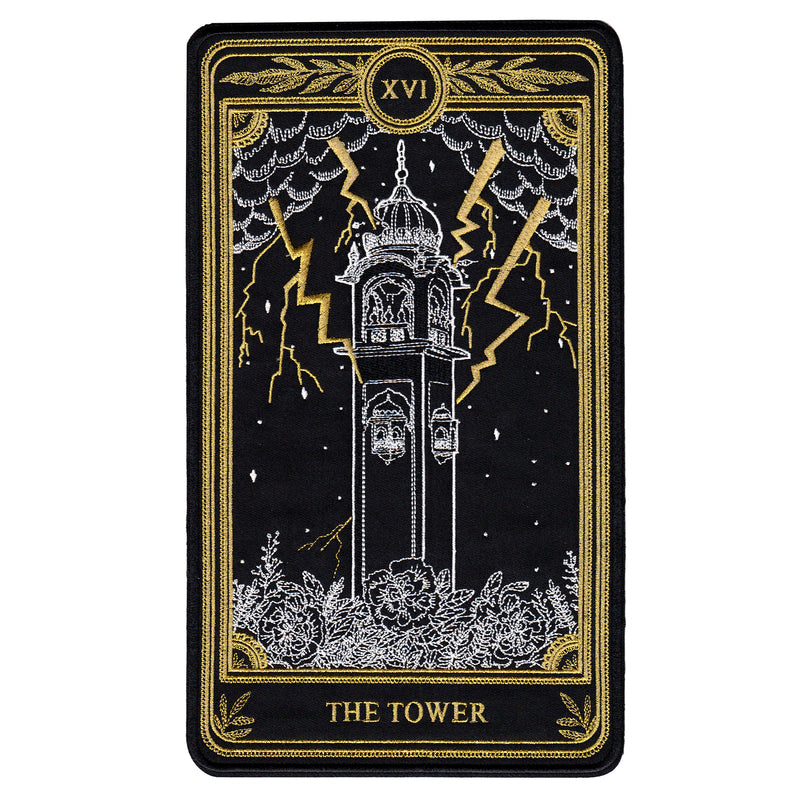 the tower tarot card embroidered iron-on patch in white, gold, and black thread design from the Marigold Tarot deck by Amrit Brar and 13th Press.
