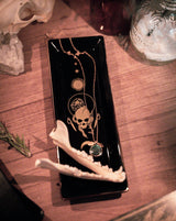ceramic trinket tray with gold design of skull and serpant for small trinkets, tarot inspired black tray. 