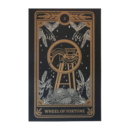 tarot card art print of the Wheel of Fortune card from the Marigold Tarot deck by Amrit Brar and 13th Press. Black print with white and gold ink. 