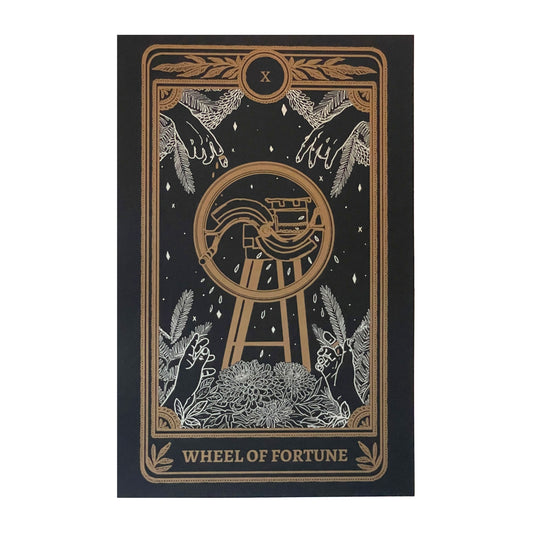 tarot card art print of the Wheel of Fortune card from the Marigold Tarot deck by Amrit Brar and 13th Press. Black print with white and gold ink. 
