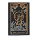 tarot card art print of the Wheel of Fortune card from the Marigold Tarot deck by Amrit Brar and 13th Press. Black print with white and gold ink. 