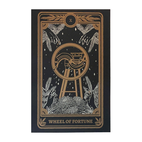 tarot card art print of the Wheel of Fortune card from the Marigold Tarot deck by Amrit Brar and 13th Press. Black print with white and gold ink. 