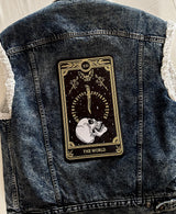 the world tarot card embroidered back patch on denim jacket iron-on; design with skull and knives